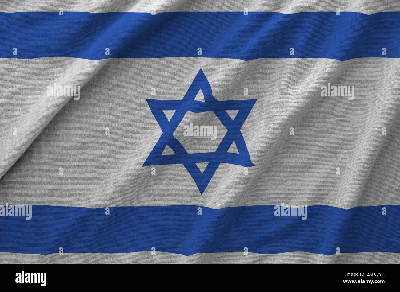Israel flag depicted on folded wavy fabric of old cloth close up Stock ...
