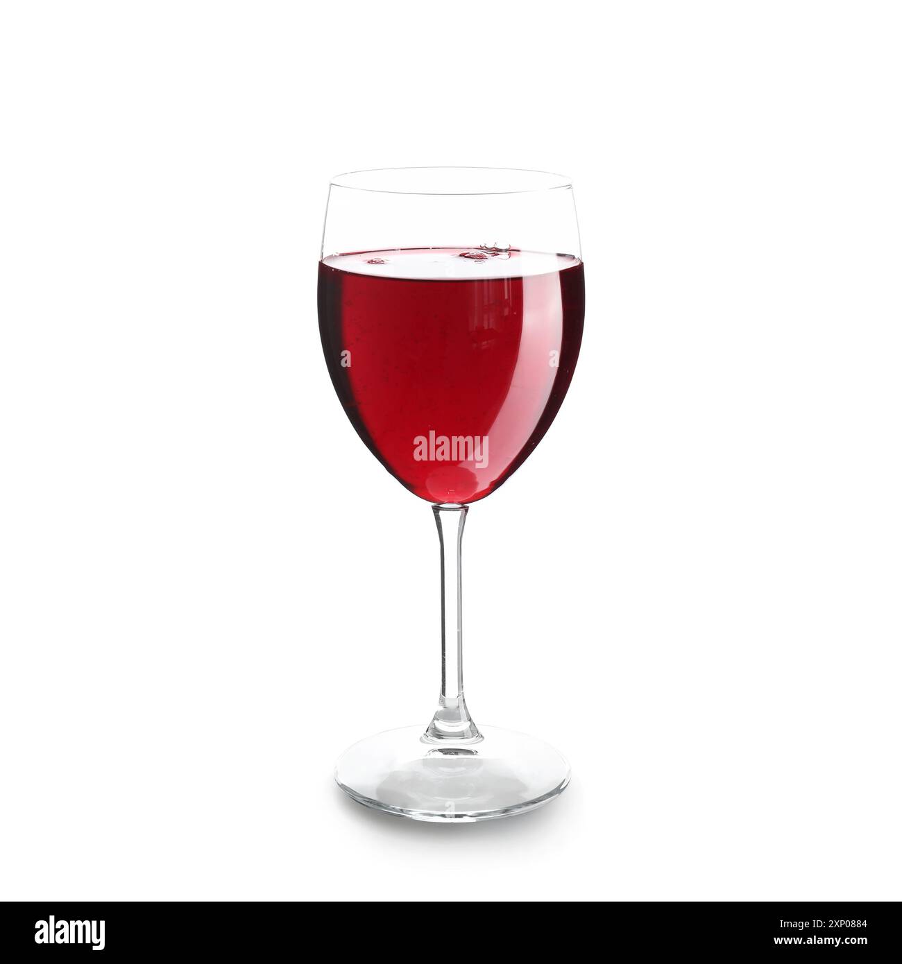 Glass of red wine on white background Stock Photo - Alamy