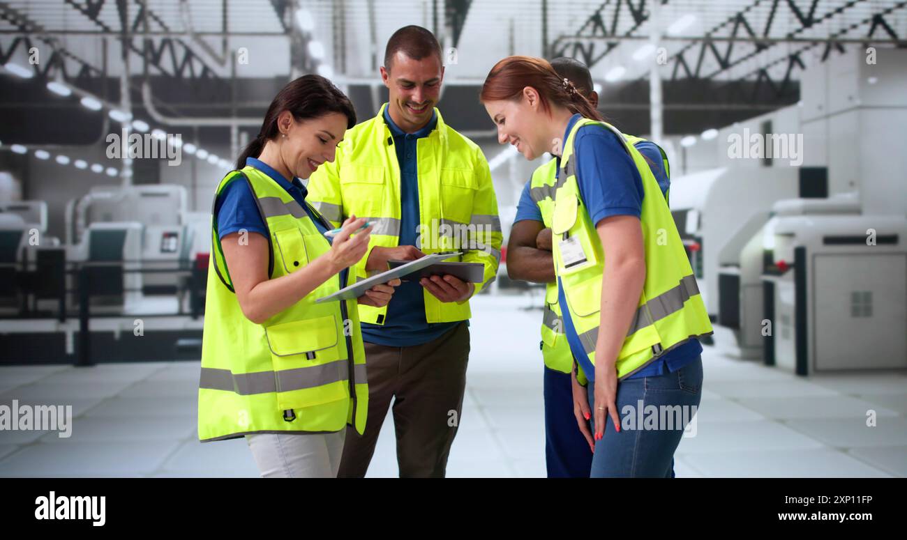 Factory Worker Osha Inspection Using Tablet Computer Stock Photo