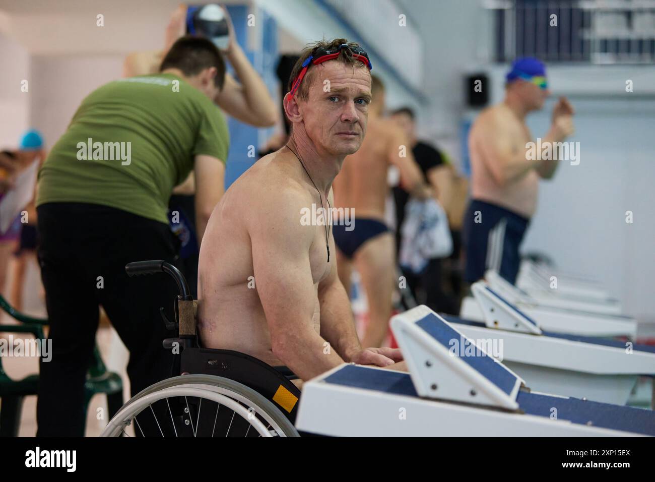 Paraplegic swimmer at Invictus Games competition in a swimming pool ...