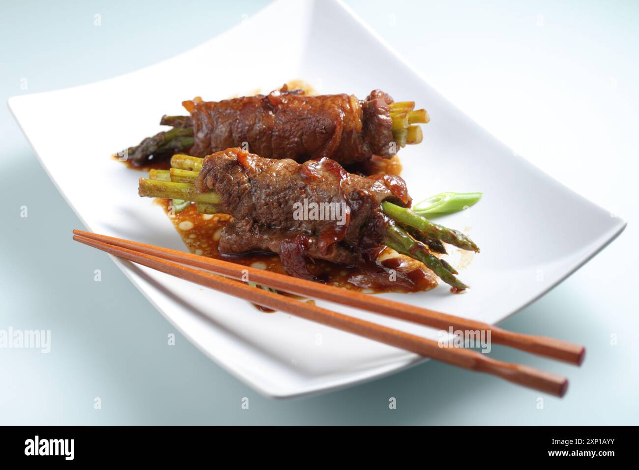 Asparagus negimaki, Japanese asparagus and beef rolls seasoned with teriyaki sauce and grilled Stock Photo