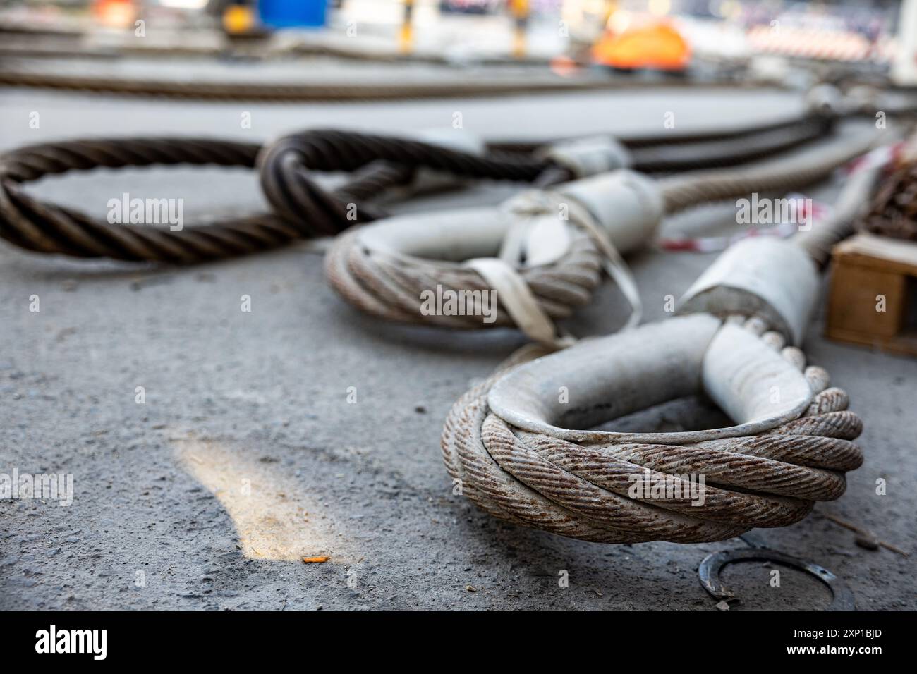 Heavy duty steel wire rope in construction site. Wire rope lifting gear Crane lifting cables are used in lifting heavy equipment. Stock Photo