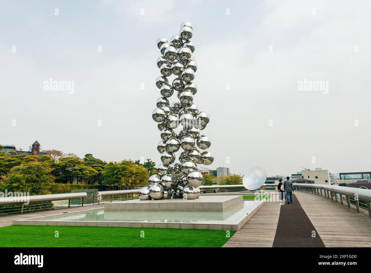 Hannam-dong, Yongsan-gu, Seoul, South Korea - August 23, 2023 Summer view of metal bead statue Tall Tree and the Ey made by Anish Kapoor . High qualit Stock Photo