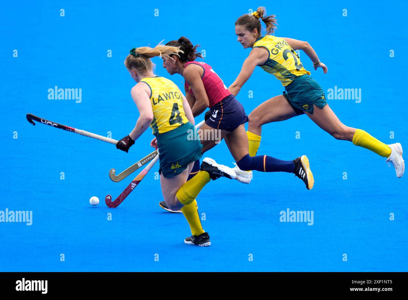Spain's Marta Segu, center, fights for the ball with Australia's Amy ...