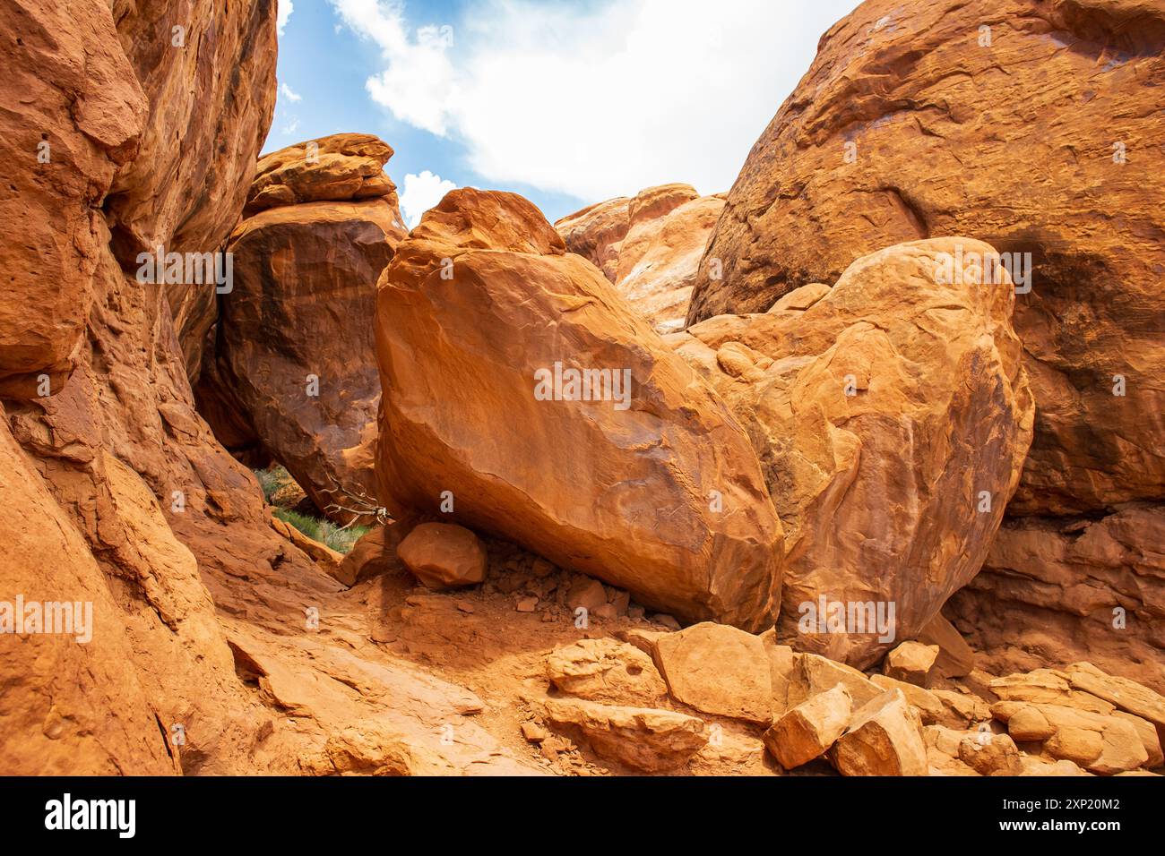 Large rocks are on the Fiery Furnace Trail in Arches National Park near ...