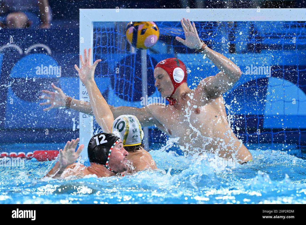 Saint Denis, France. 03rd Aug, 2024. Hungarian water polo player Denes Varga gets past