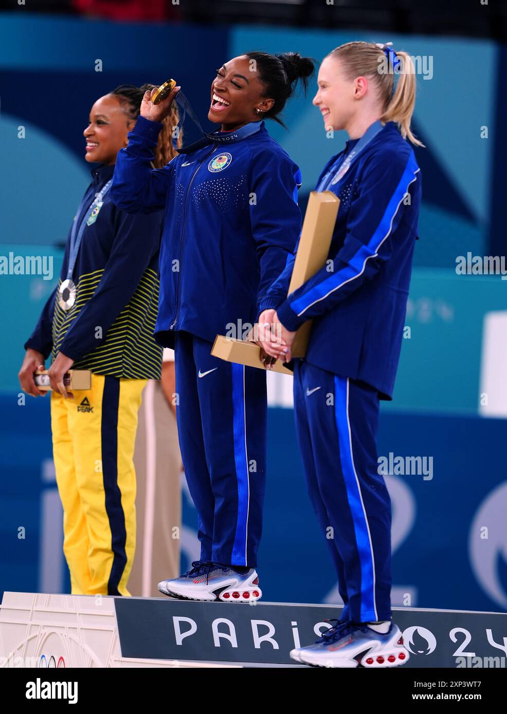 USA's Simone Biles (gold), Brazil's Rebeca Andrade (silver) and USA's