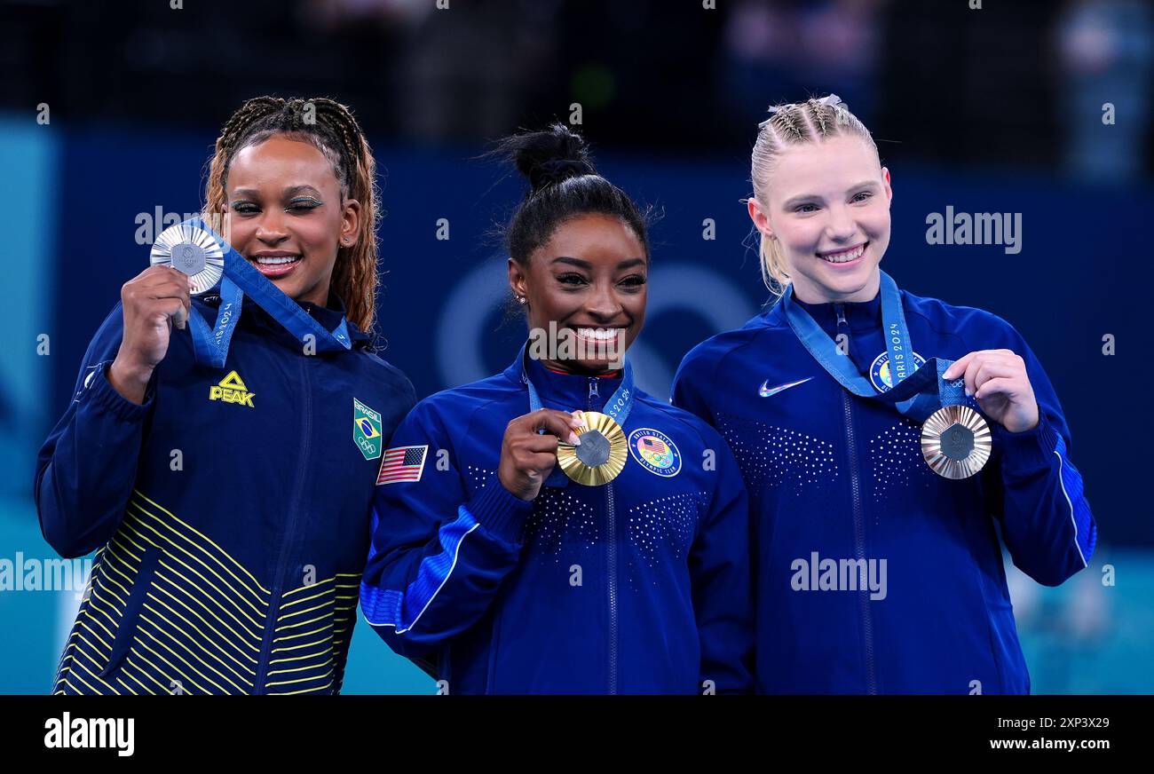 USA's Simone Biles (gold), Brazil's Rebeca Andrade (silver) and USA's
