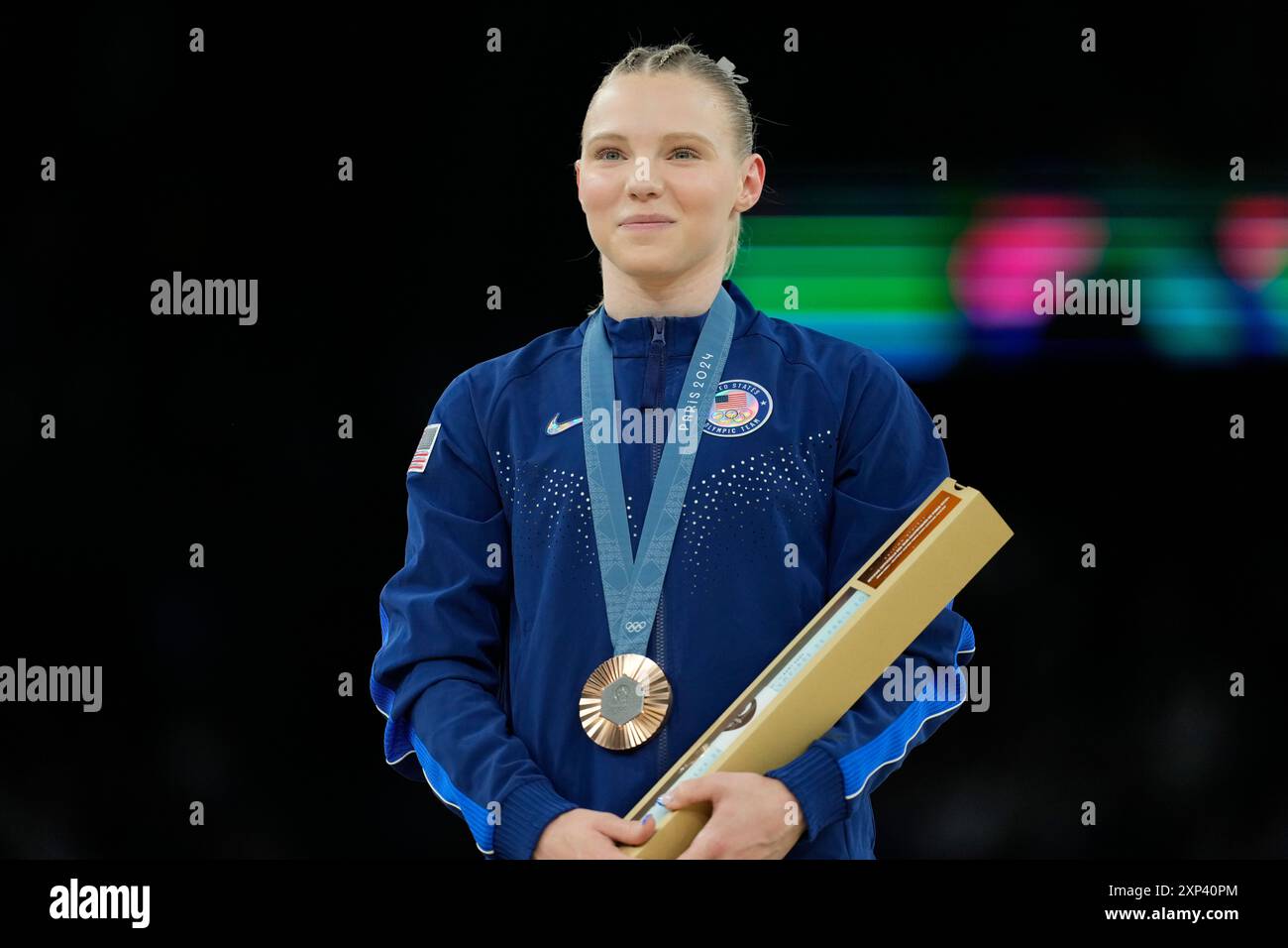 Jade Carey, of the United States, celebrates after winning the bronze