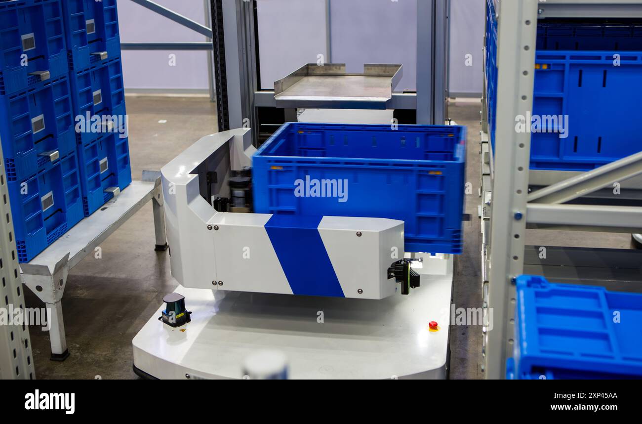 Autonomous robot picking materials from multi-layer rack in modern ...