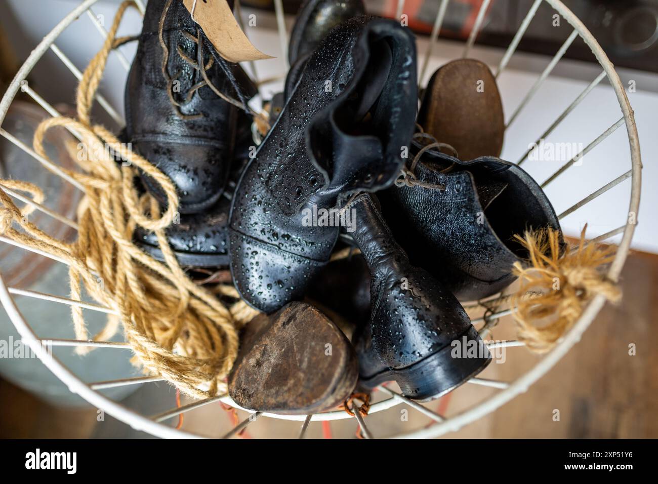 Army surplus store selling leather boots, UK Stock Photo