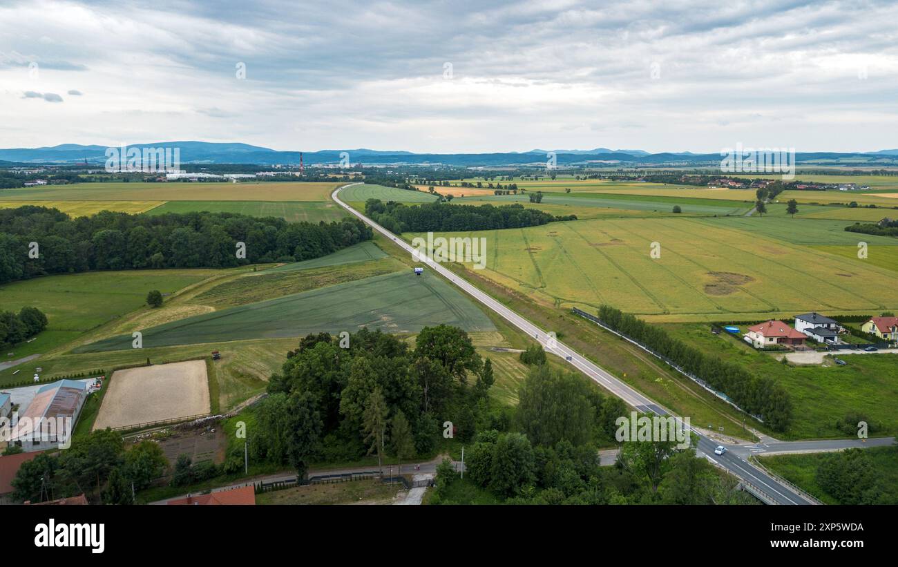 Aerial View of Open Fields and Winding Roads in a Tranquil Rural Landscape Stock Photo