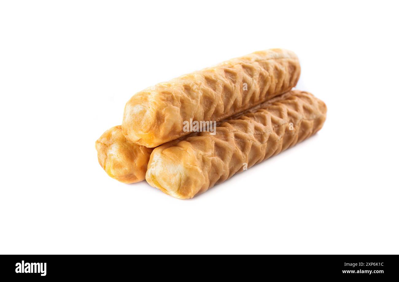 Pile of asian breadsticks with cheese flavor isolated on white background Stock Photo