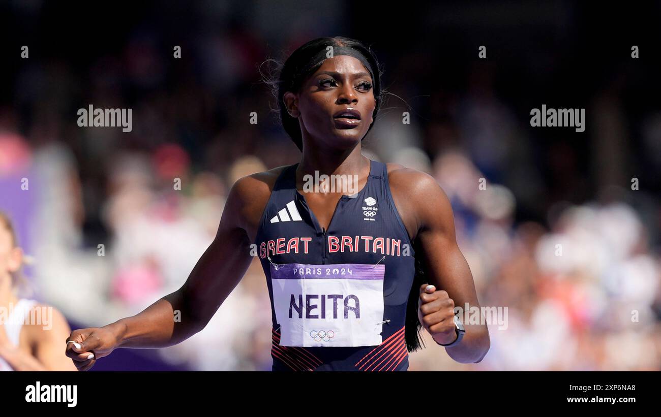 Daryll Neita, of Britain, wins a heat in the women's 200-meter at the ...