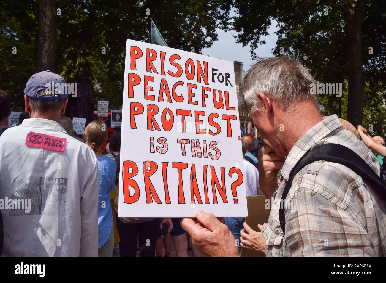 Protesting Uk London, UK. 3rd August 2024. Protesters gathered in Parliament Square ...