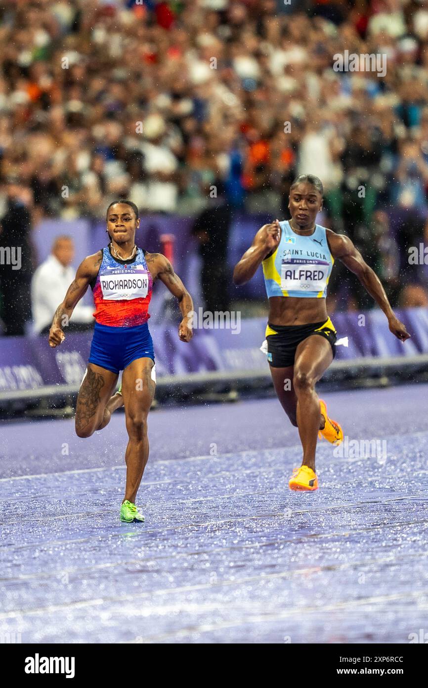Julien Alfred (LCA) competing in the Women's 100m Final, wins the gold