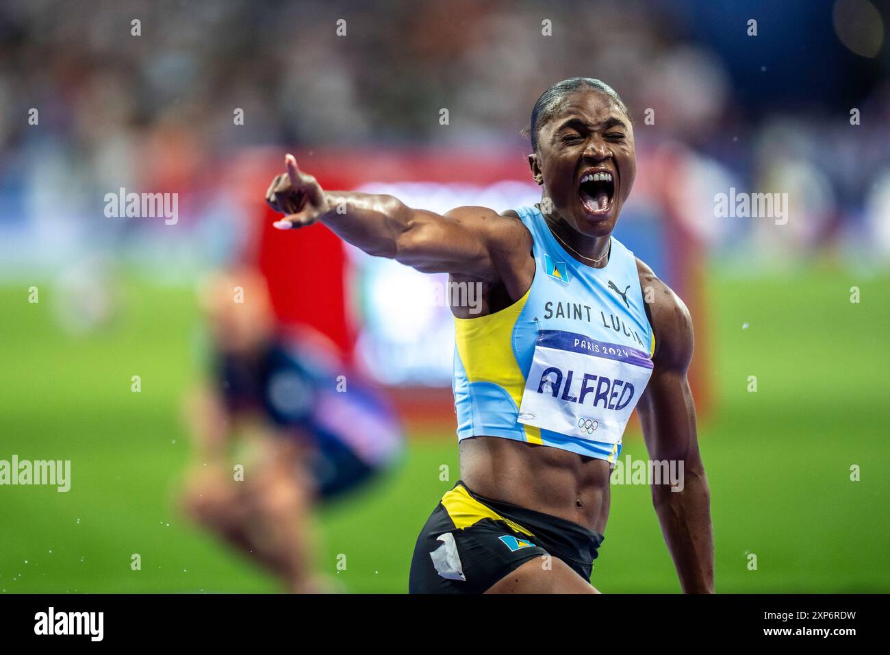 Julien Alfred (LCA) competing in the Womens 100m Final, wons the gold