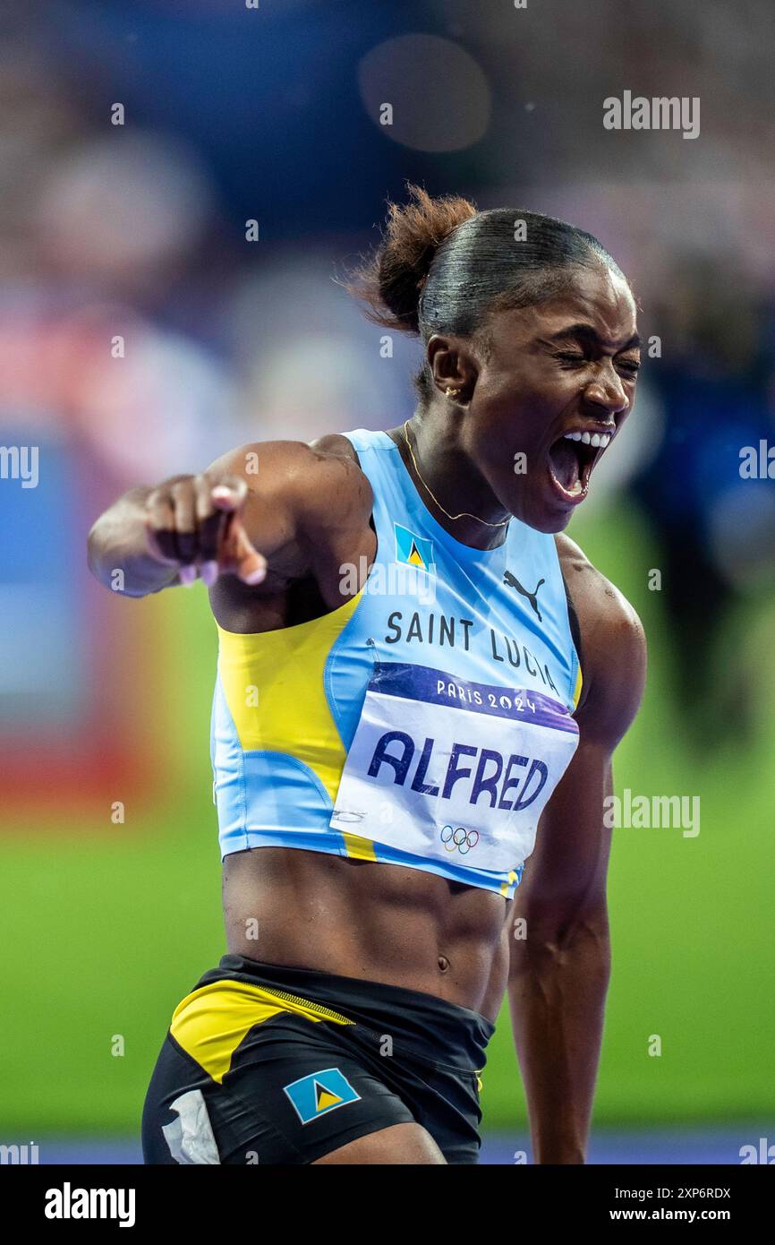 Julien Alfred (LCA) competing in the Womens 100m Final, wins the gold