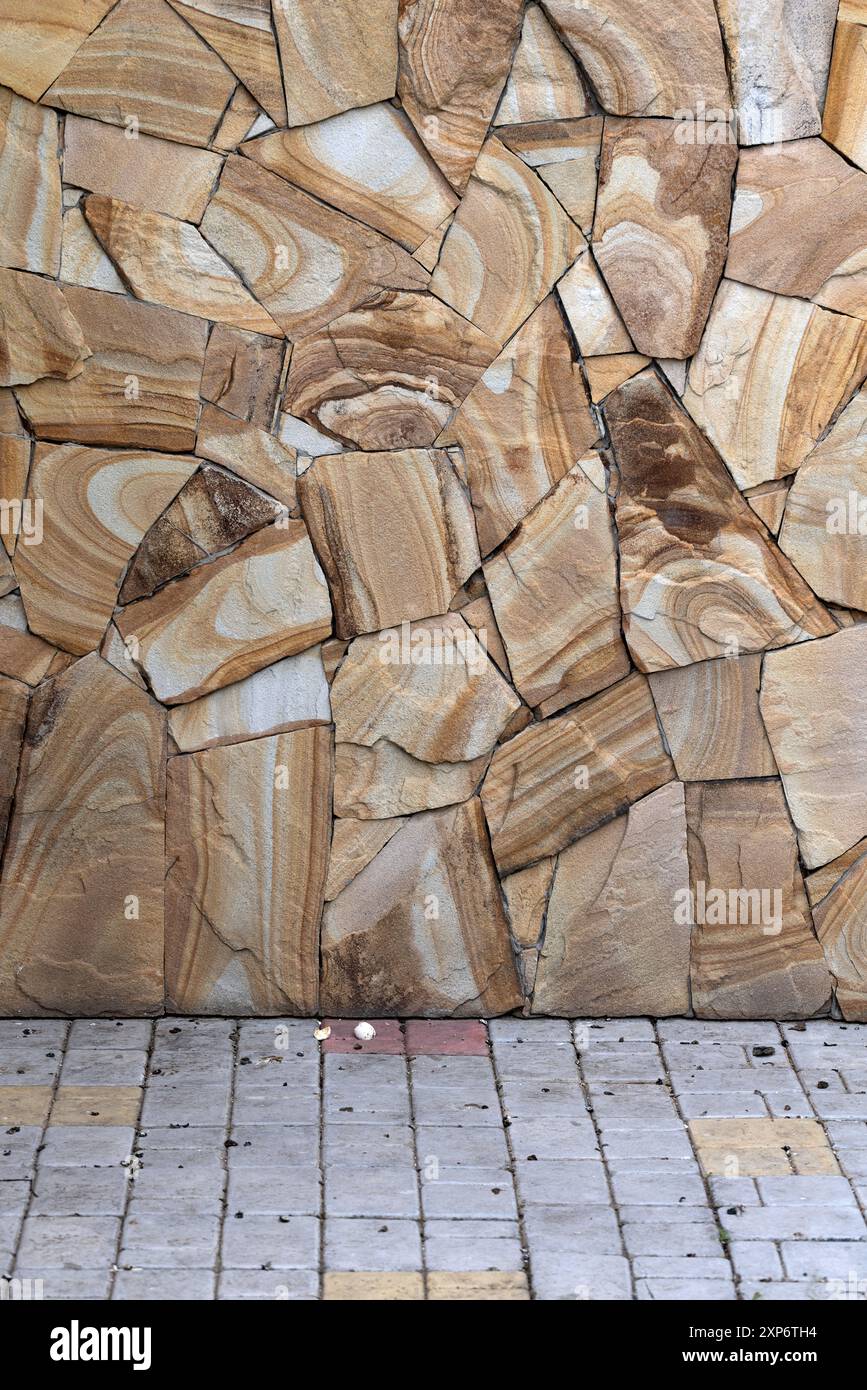 Weathered old stone wall as creative background texture. Natural stone ...