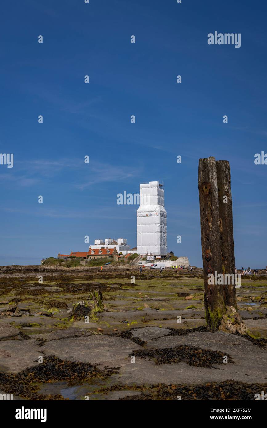 St Mary's lighthouse, Whitley Bay, under wraps while being repainted. Stock Photo