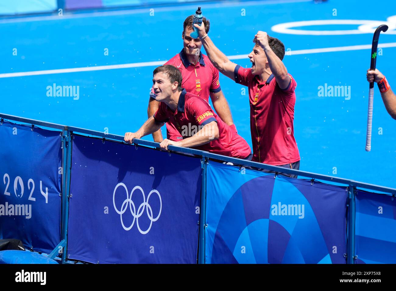 Spanish players celebrate after their win against Belgium in the men's ...