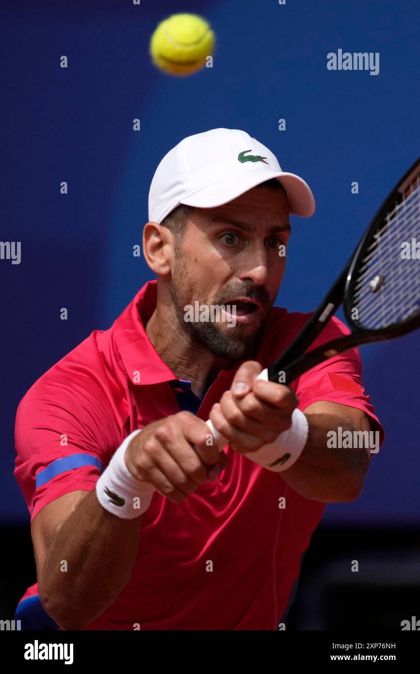 Serbia s Novak Djokovic Backhands To Spain s Carlos Alcaraz During The serbia-s-novak-djokovic-backhands-to-spain-s-carlos-alcaraz-during-the