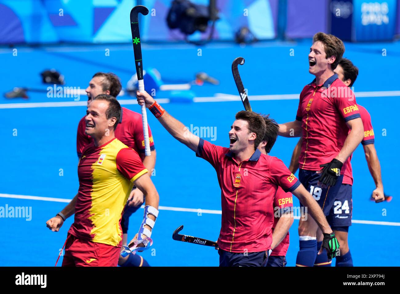 Spanish players celebrate after their win against Belgium in the men's ...