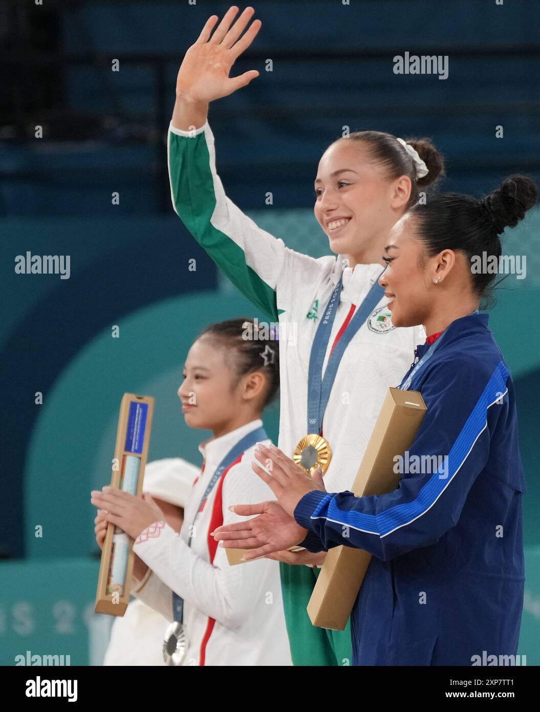 Paris, France. 04th Aug, 2024. Women's Gymnastics Uneven Bars gold medalist Kaylia Nemour of Algeria (C), silver medalist Qiyan Qiu of the Peoples Republic of China (L) and bronze medalist Sunisa Lee of the U.S. stand on the podium at the Paris 2024 Olympic Games in Paris, France on Sunday, August 4, 2024. Photo by Pat Benic/UPI Credit: UPI/Alamy Live News Stock Photo