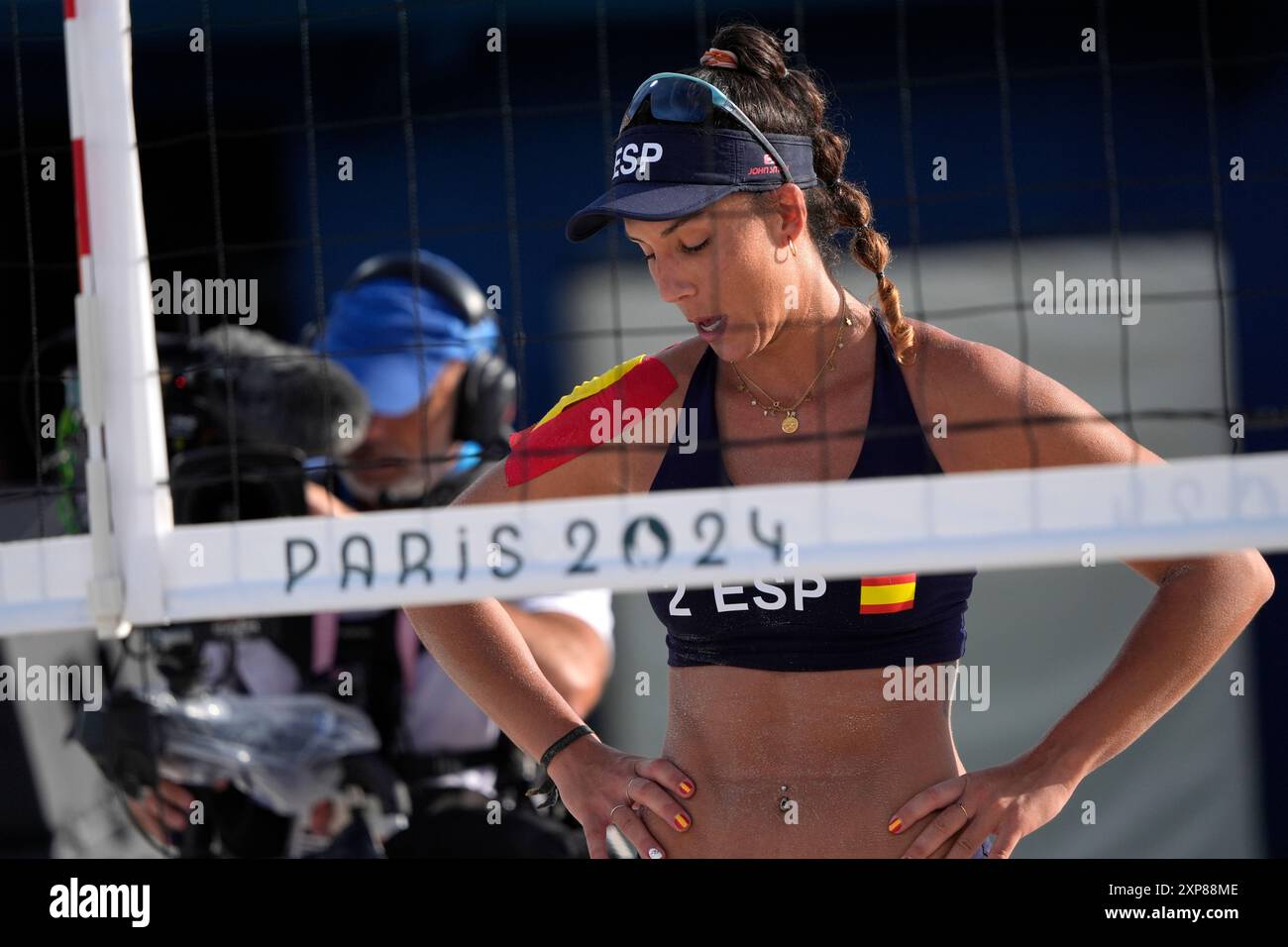 Spain's Paula Soria Gutierrez reacts after losing to Switzerland in a beach volleyball match at
