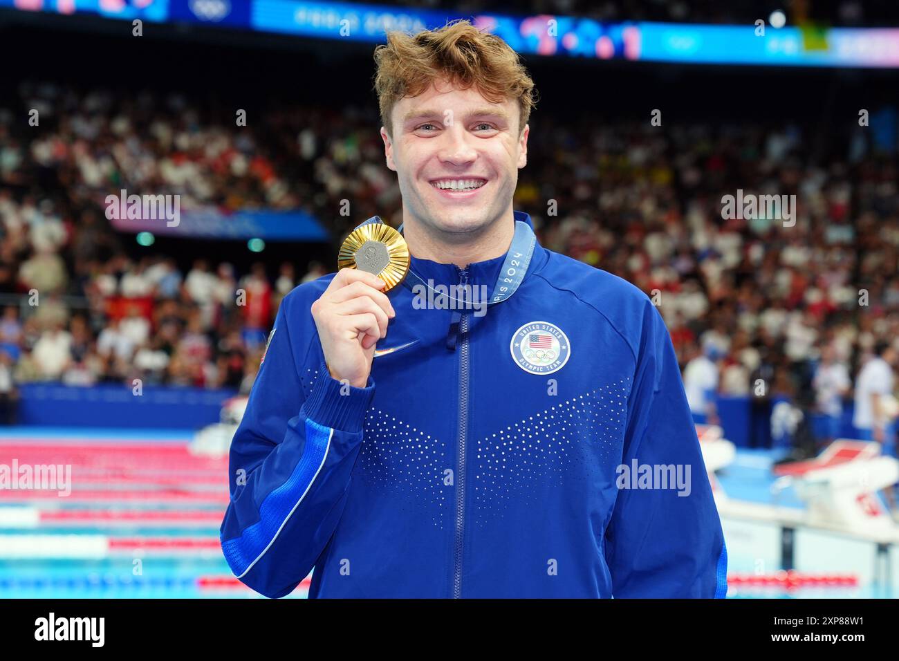 USA's Bobby Finke celebrates with the gold medal following the Men's