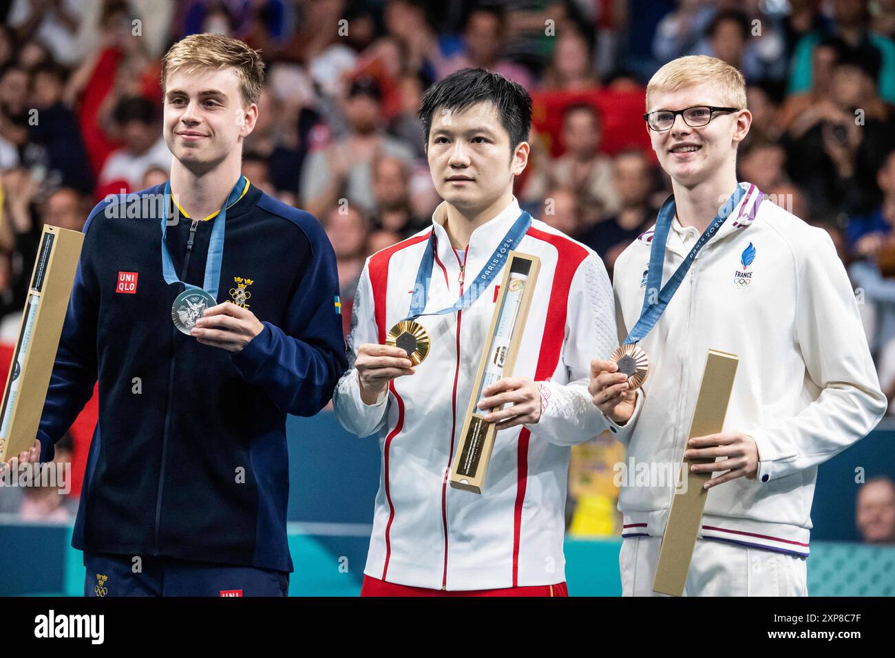 Truls Moregard Silver medal, Fan Zhendong of China Gold medal, Felix Lebrun of France Bronze