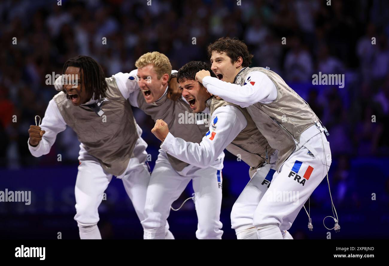 Philippe Riboud Members of France react after winning the men's fencing foil team match ...