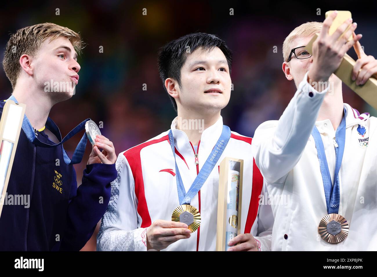 PARIS, FRANCE AUGUST 04 Fan Zhendong of China wins Gold, Truls Moregard of Sweden Silver and