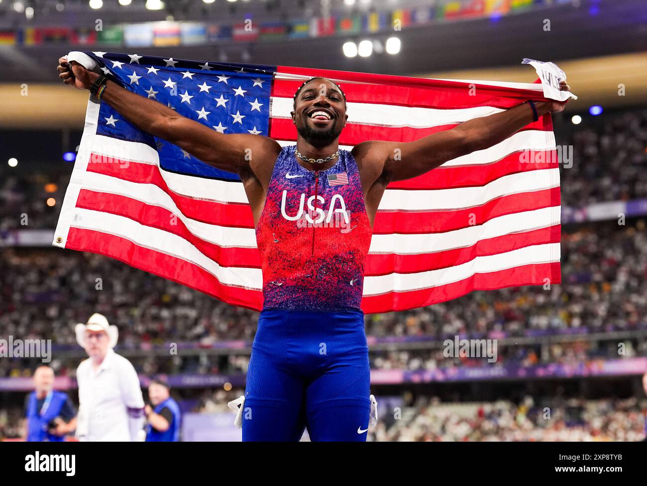 USA's Noah Lyles celebrates winning the Men's 100m Final at the Stade