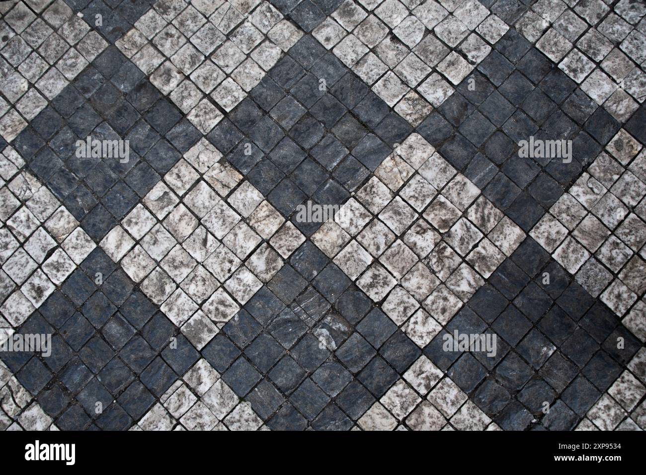 Tile Street Pattern Texture Texture. Black and white tile pattern on a city street. Copy Space ...