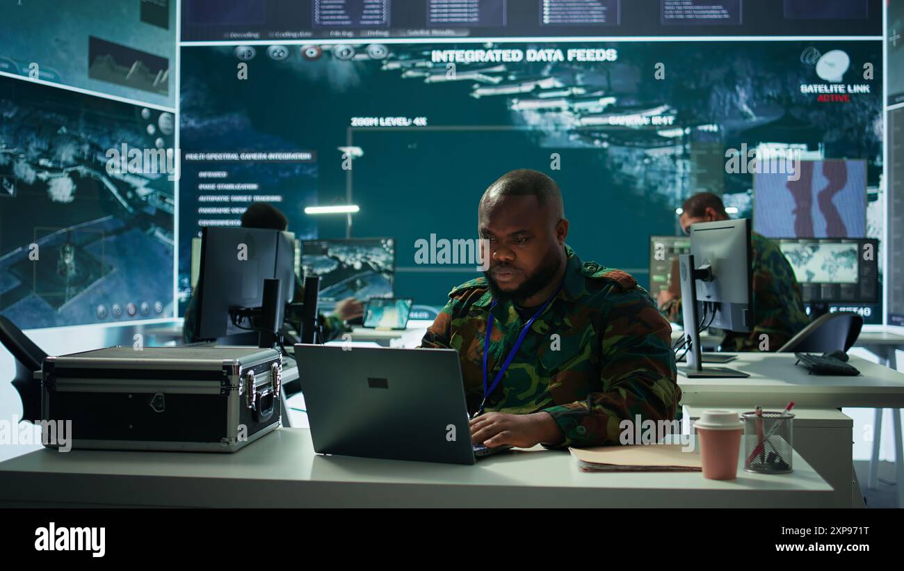 Army intelligence expert utilizes modern computer systems and satellite ...