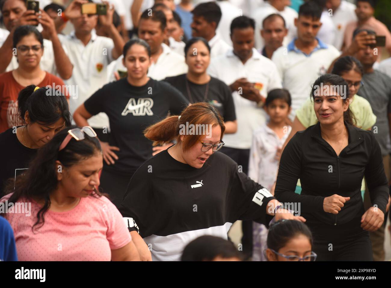 GURUGRAM, INDIA - AUGUST 4: People participated in various activities like cycling, Ludo, Skateboard, Snakes and Ladders, Zumba dance, yoga, badminton, cricket and carrom board etc on the Raahgiri Day at Surya Vihar Main Road organized by District Administration, Gurugram Police, Haryana Uday and Raahgiri Foundation, on August 4, 2024 in Gurugram, India. (Photo by Parveen Kumar/Hindustan Times/Sipa USA ) Credit: Sipa USA/Alamy Live News Stock Photo