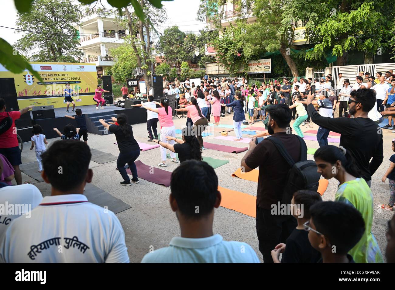 GURUGRAM, INDIA - AUGUST 4: People participated in various activities like cycling, Ludo, Skateboard, Snakes and Ladders, Zumba dance, yoga, badminton, cricket and carrom board etc on the Raahgiri Day at Surya Vihar Main Road organized by District Administration, Gurugram Police, Haryana Uday and Raahgiri Foundation, on August 4, 2024 in Gurugram, India. (Photo by Parveen Kumar/Hindustan Times/Sipa USA ) Credit: Sipa USA/Alamy Live News Stock Photo