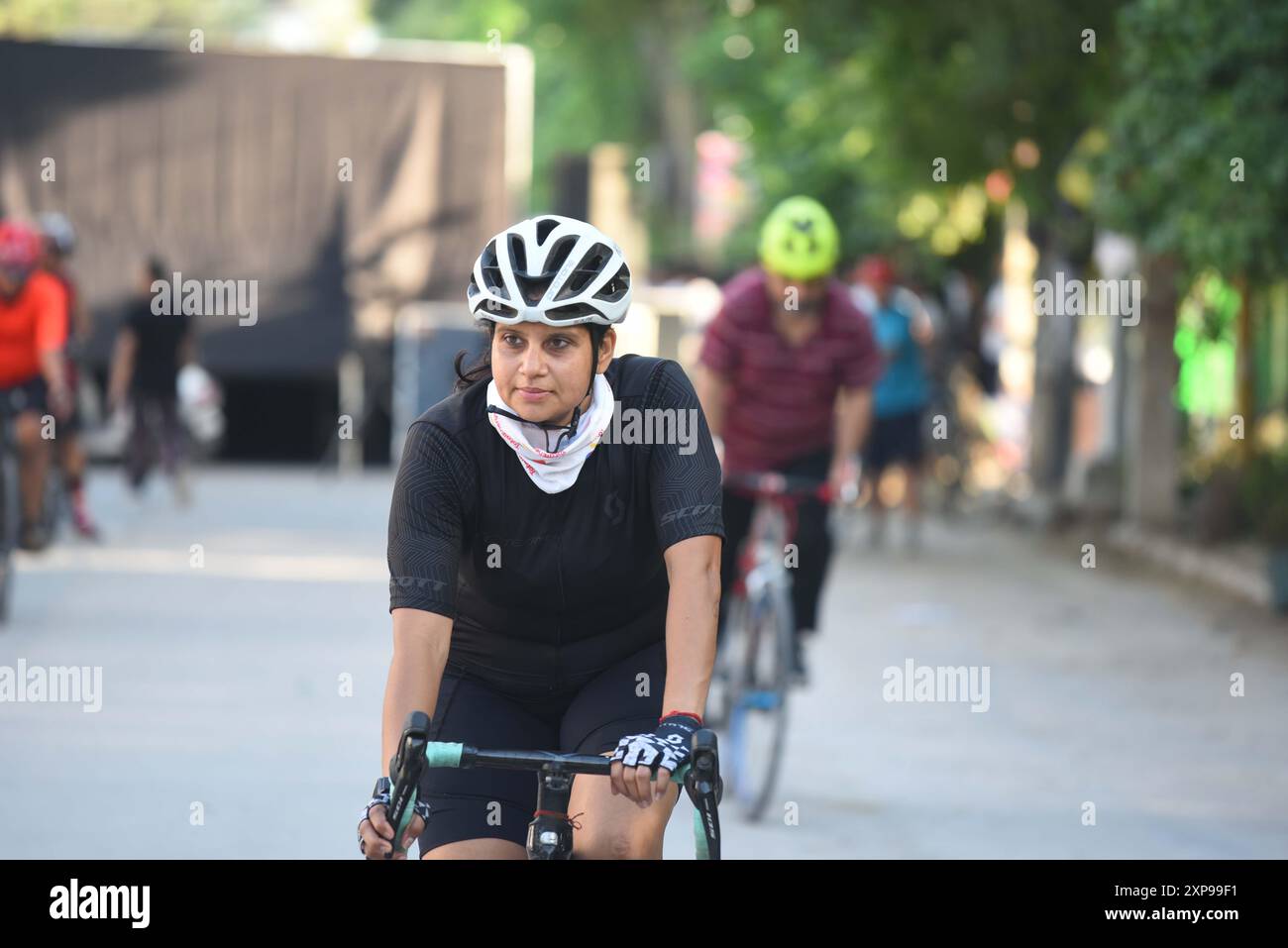 GURUGRAM, INDIA - AUGUST 4: People participated in various activities like cycling, Ludo, Skateboard, Snakes and Ladders, Zumba dance, yoga, badminton, cricket and carrom board etc on the Raahgiri Day at Surya Vihar Main Road organized by District Administration, Gurugram Police, Haryana Uday and Raahgiri Foundation, on August 4, 2024 in Gurugram, India. (Photo by Parveen Kumar/Hindustan Times/Sipa USA ) Credit: Sipa USA/Alamy Live News Stock Photo