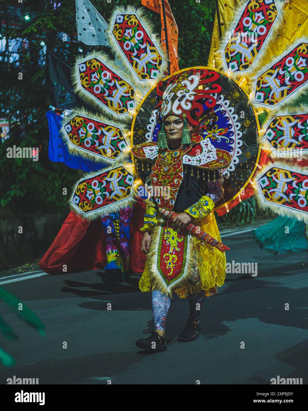 Balikpapan, Indonesia - June 5th, 2024. The model walk down the street on a parade during the Indonesian cultural festival fashion show. Stock Photo
