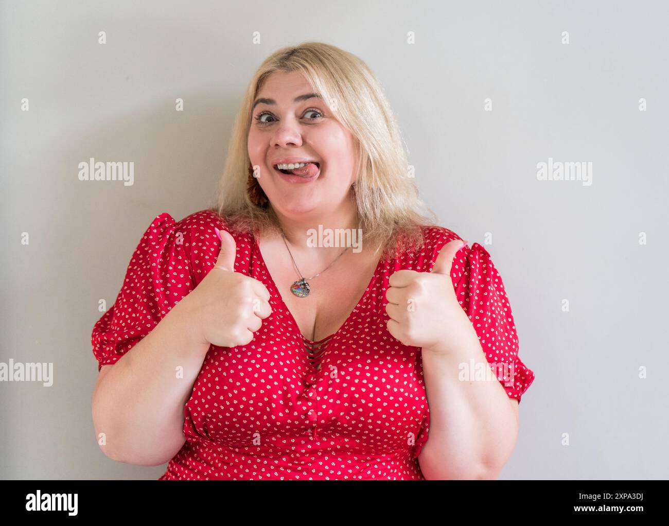 Enthusiastic woman thumbs up hi-res stock photography and images - Alamy