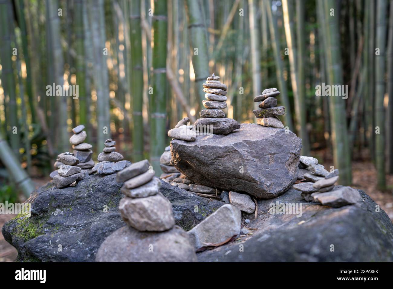 Stoacked Rocks Stacked rocks outdoors with greenery and water hi-res stock photography ...
