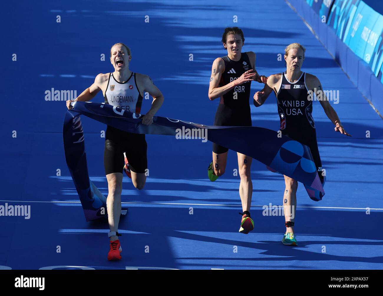 Paris, France. 05th Aug, 2024. Germany's Laura Lindemann wins the Gold medal In the Mixed Team Triathlon with USA's Taylor Knibb, in Silver and GBR's Beth Potter in Bronze at Port Alexandre III on the tenth day of the Paris Olympics on Monday, August 05, 2024. Photo by Hugo Philpott/UPI Credit: UPI/Alamy Live News Stock Photo