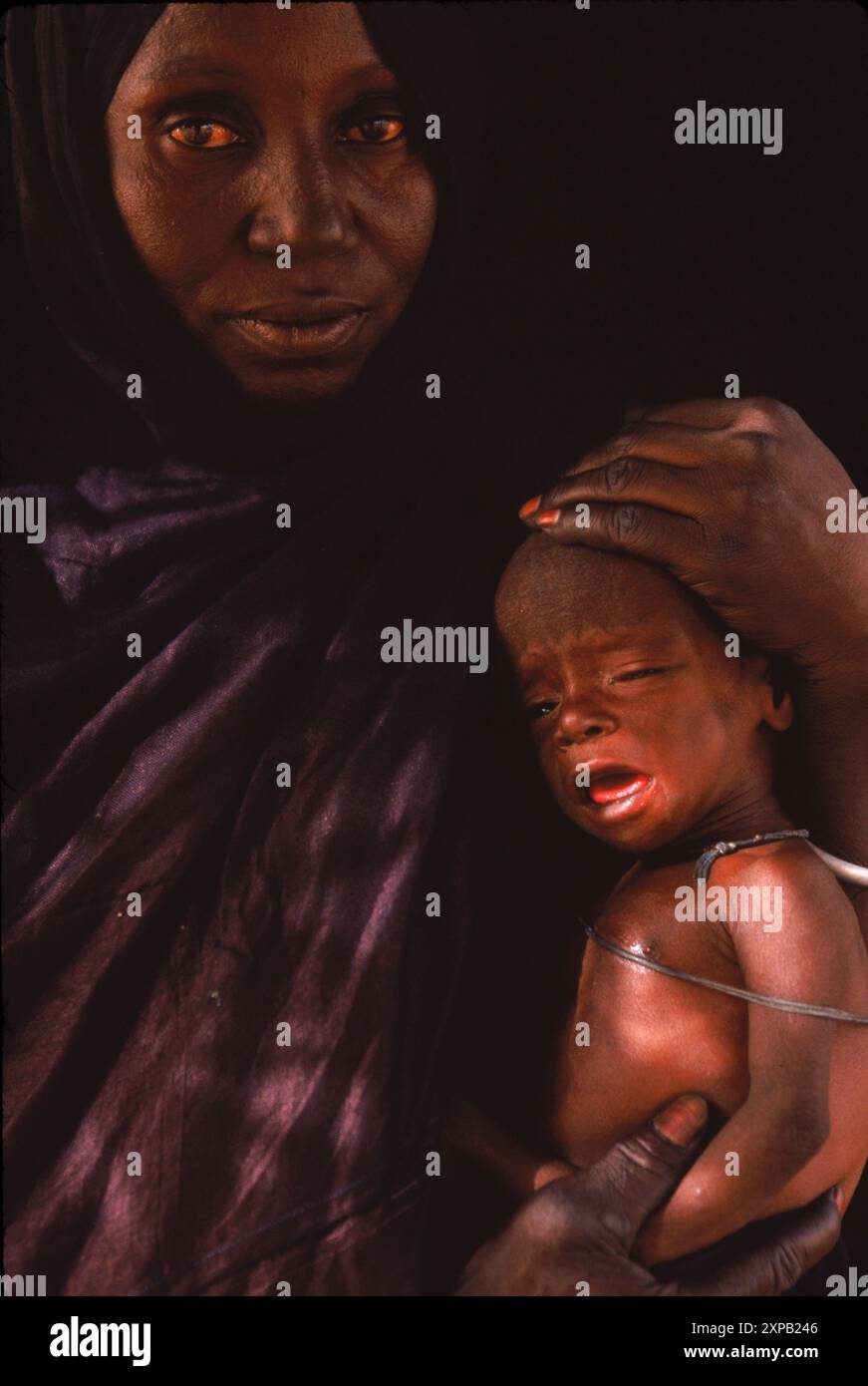 Portrait of woman and child from village of Guielle, Mali, West Africa. Stock Photo