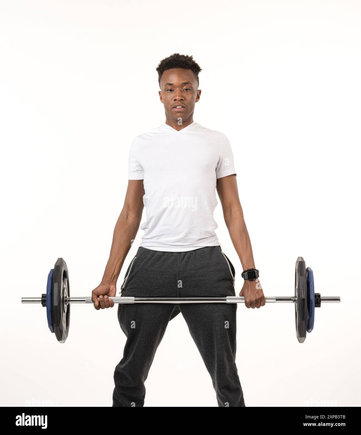 black man does squats on white Stock Photo