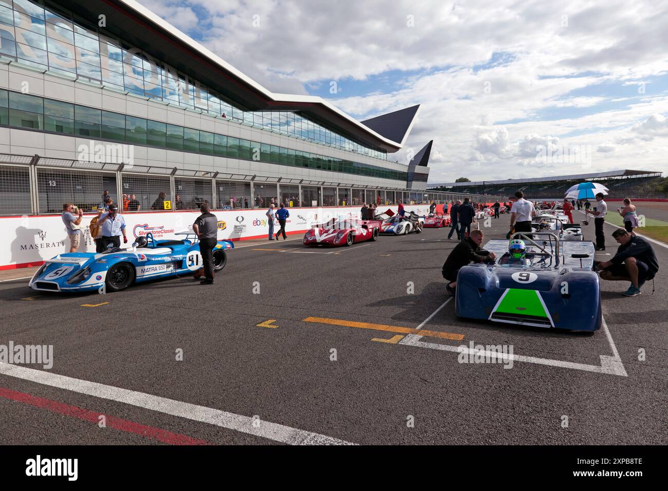 Competitors line up on the grid, before the start of the FIA Masters ...