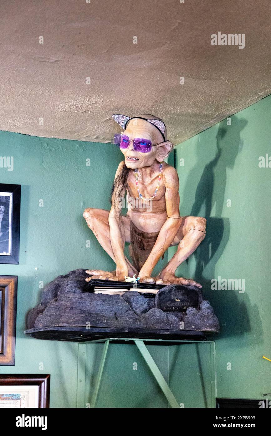 Statue of Gollum in sunglasses at the Hobbit Cafe - Tolkien and Lord of the Rings themed restaurant, Houston, Texas Stock Photo