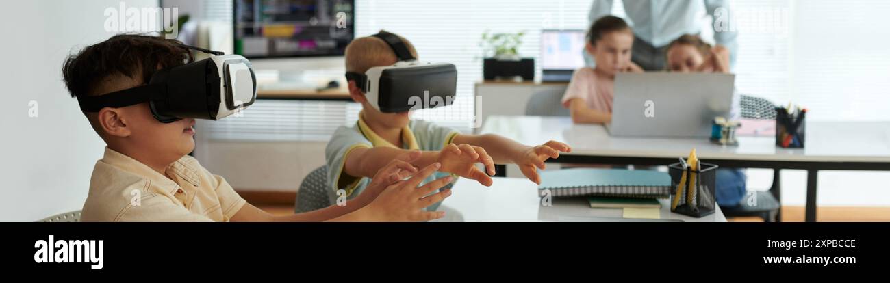 Kids Using Virtual Reality Headsets in Classroom Setting Stock Photo ...