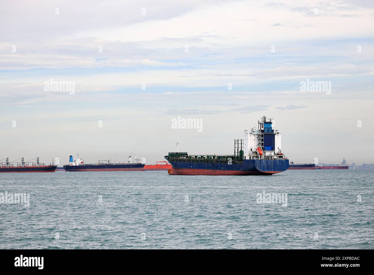 Large Container Ship anchored in Singapore Strait Stock Photo - Alamy
