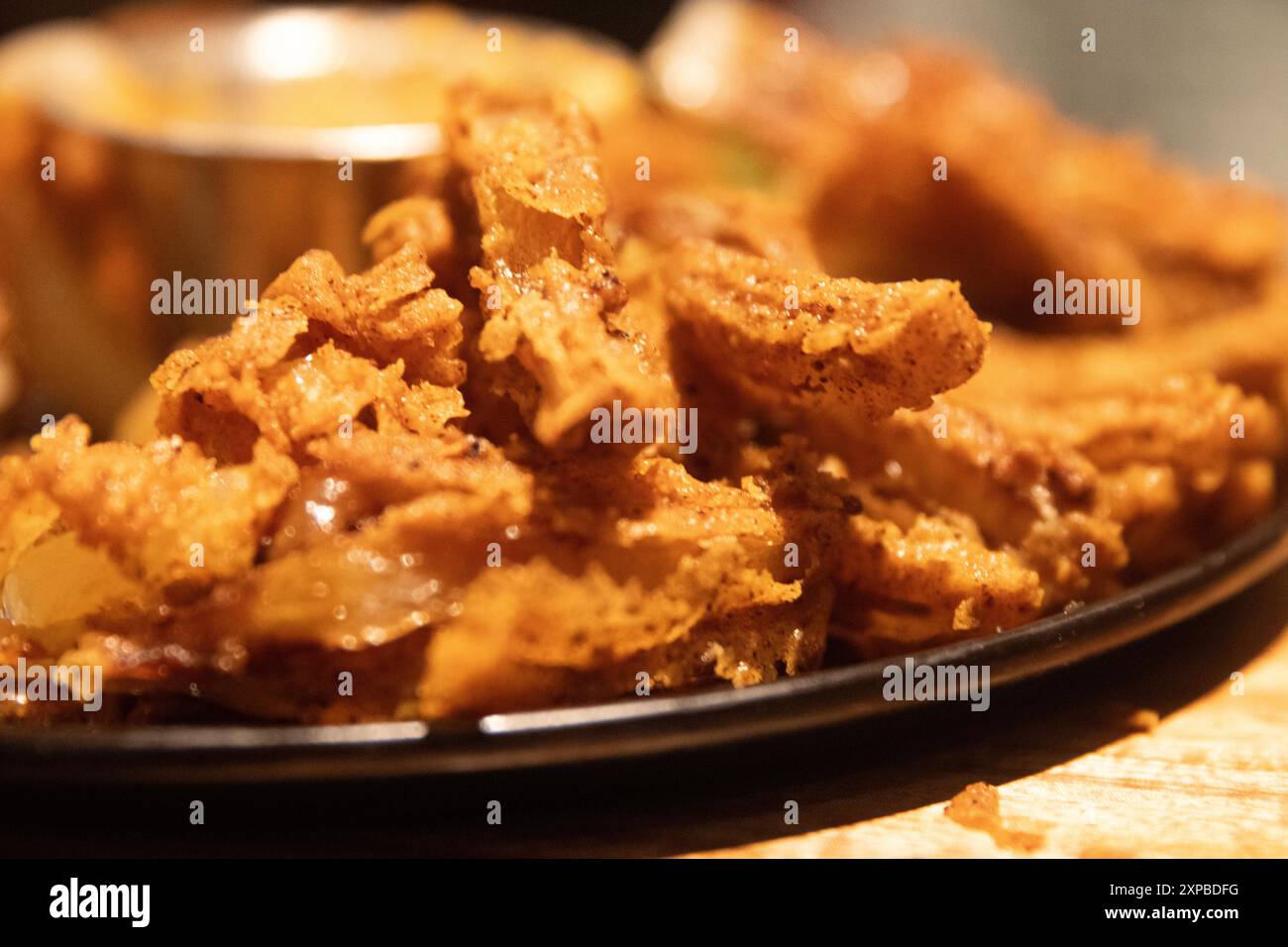 Fried beer batter onion rings hi-res stock photography and images - Alamy